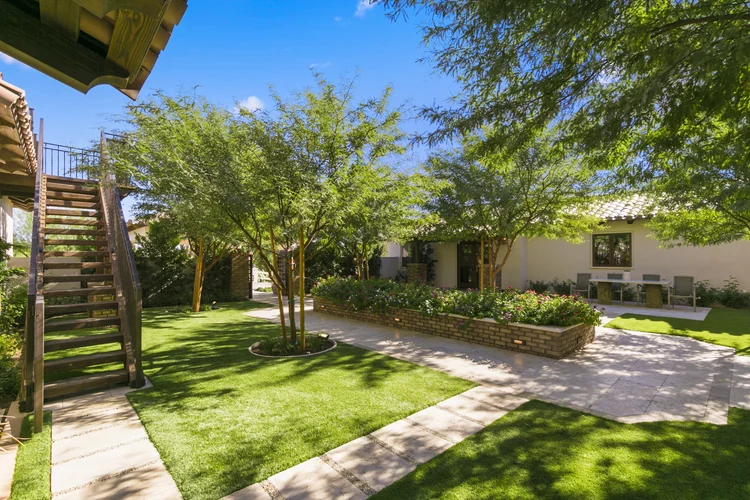 Lush courtyard with stone pathways