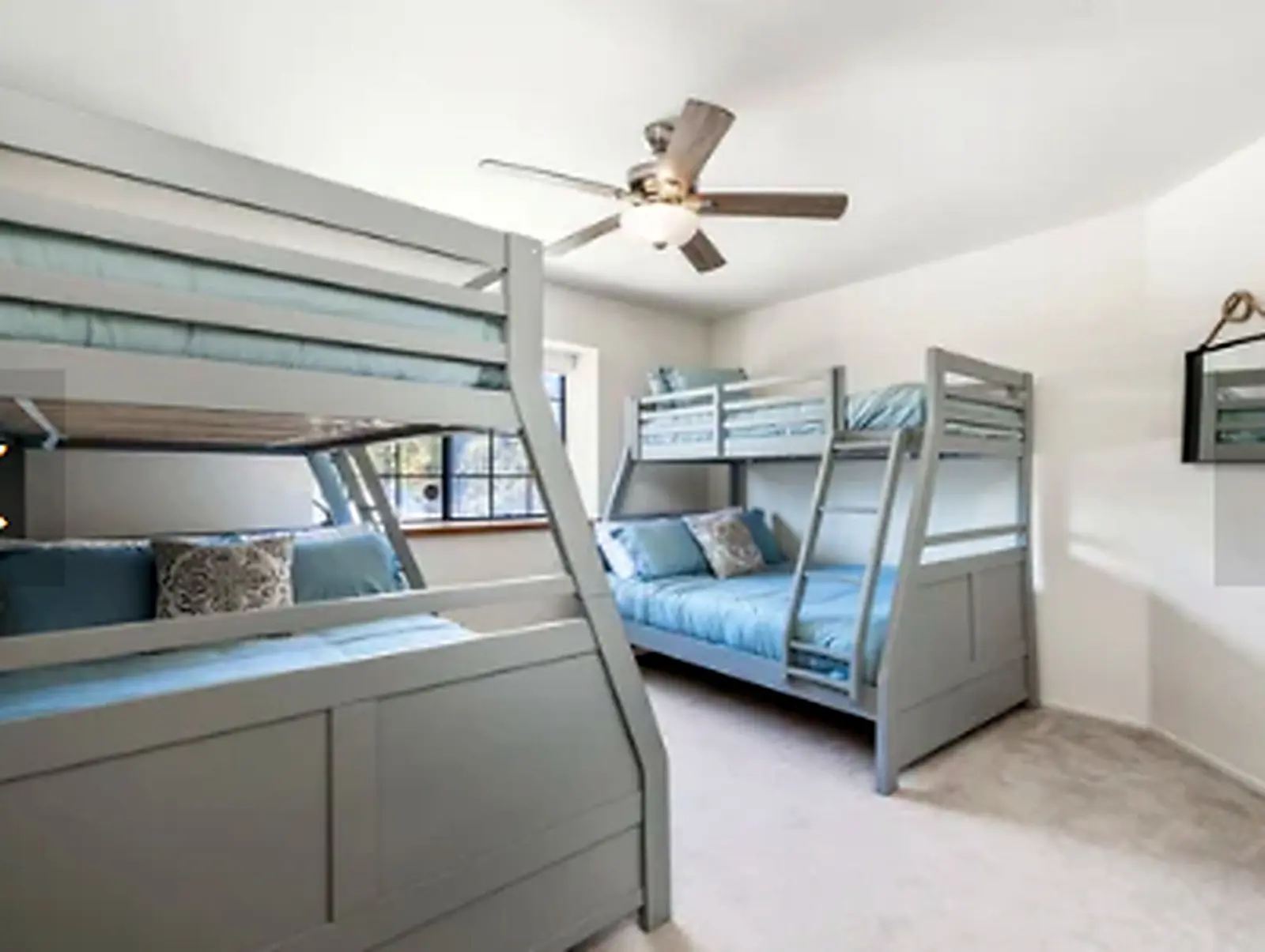Bunk bed room with blue bedding