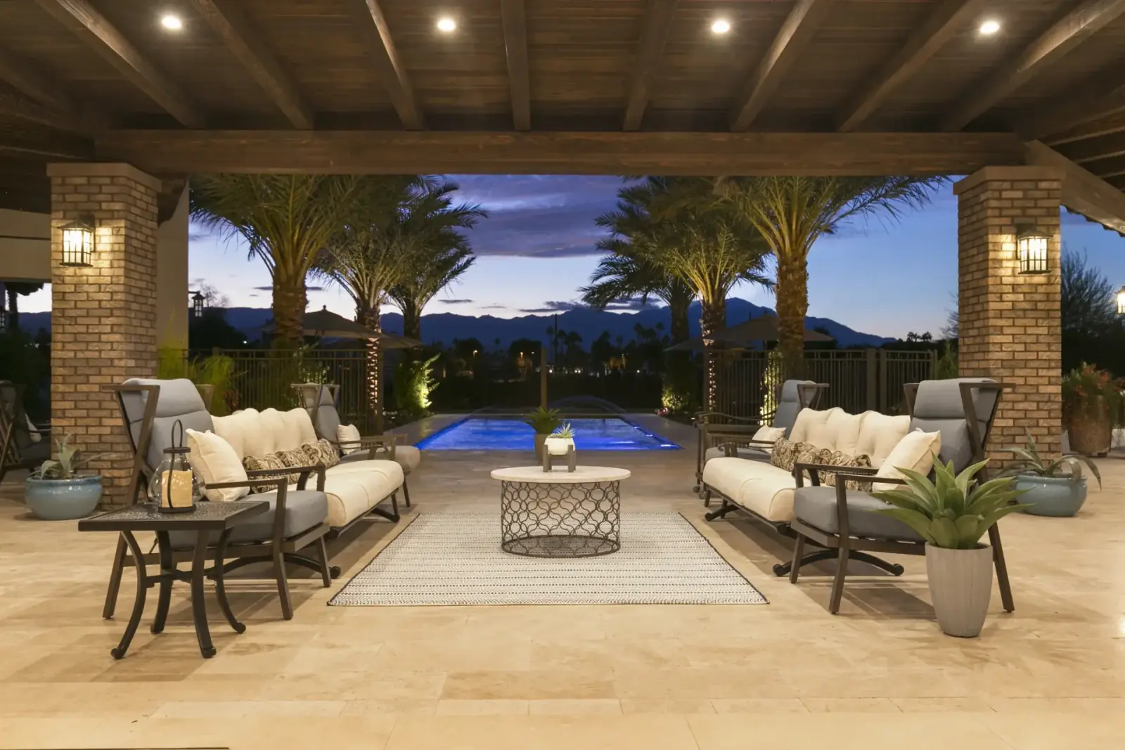 Outdoor lounge with pool view